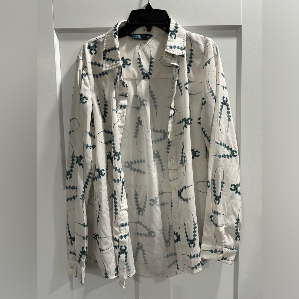 Women’s white blouse with turquoise squash blossoms